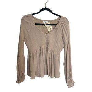 Tan cropped smocked peplum top